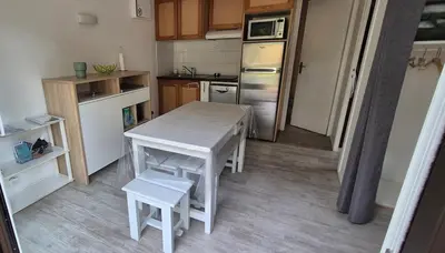 Cuisine ou kitchenette dans l'établissement Léon Apartment