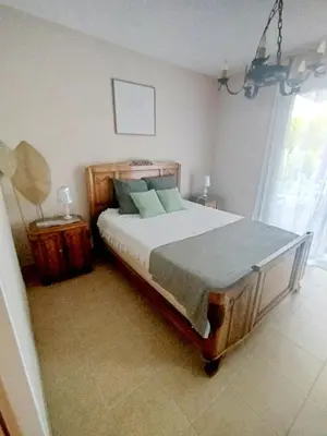 Un ou plusieurs lits dans un hébergement de l'établissement Maison individuelle 6 personnes calme et lumineuse 3 chambres