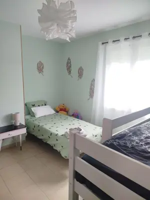 Un ou plusieurs lits dans un hébergement de l'établissement Maison individuelle 6 personnes calme et lumineuse 3 chambres