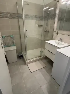 Salle de bains dans l'établissement Le petit nid douillet du Bassin T2