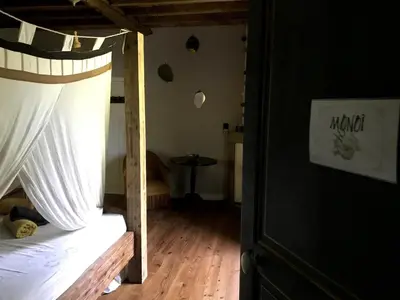 Un ou plusieurs lits dans un hébergement de l'établissement Maison à la campagne entre montagne et mer