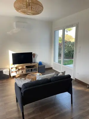 Coin salon dans l'établissement Magnifique maison neuve Mimizan plage entre pins et océan
