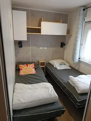 Un ou plusieurs lits dans un hébergement de l'établissement Superbe mobil-home à Seignosse plage