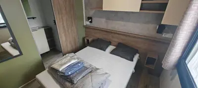 Un ou plusieurs lits dans un hébergement de l'établissement MH310 2 chambres et 2 salles de bain de 40m2 dans camping 4 étoiles
