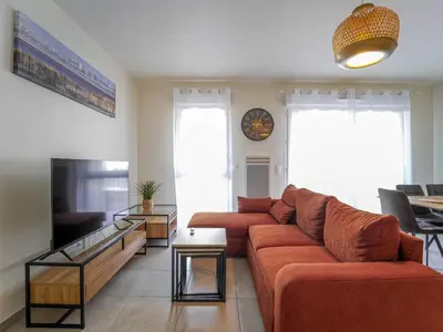 Télévision ou salle de divertissement dans l'établissement Mimizan Plage - Appartement 6 pers à 400m de l'océan - Terrasse et Parking - FR-1-50-195