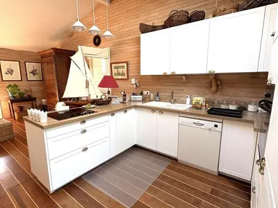 Cuisine ou kitchenette dans l'établissement Charmante villa familiale au Cap Ferret, proche plages, 9 pers - FR-1-736-68