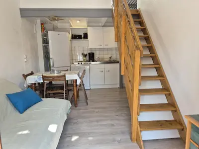 Cuisine ou kitchenette dans l'établissement À deux pas du courant