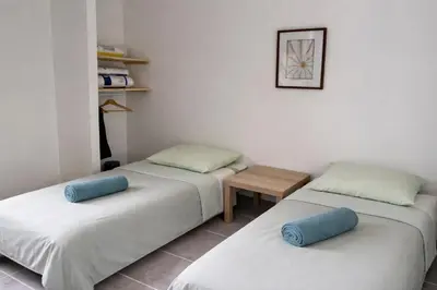 Un ou plusieurs lits dans un hébergement de l'établissement Gite du Lac T4