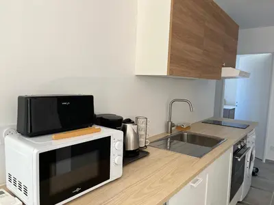 Cuisine ou kitchenette dans l'établissement Gite du Lac T2