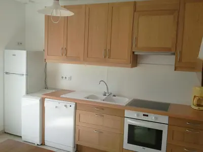 Cuisine ou kitchenette dans l'établissement Four à Pain