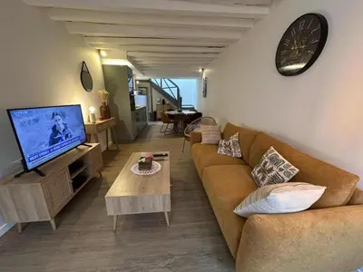 Télévision ou salle de divertissement dans l'établissement Escapade grenadoise