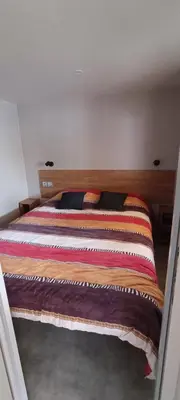 Un ou plusieurs lits dans un hébergement de l'établissement Mobil home chez Thierry et Véro