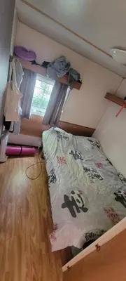 Un ou plusieurs lits dans un hébergement de l'établissement Mobil-home climatisé 4 pers 2 chambres