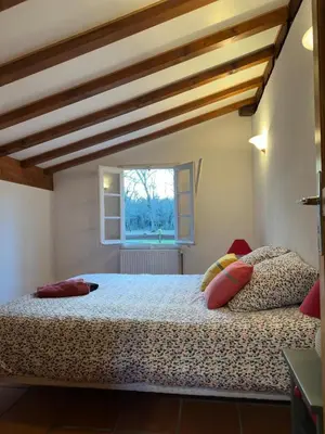 Un ou plusieurs lits dans un hébergement de l'établissement Ferme landaise avec Piscine , 4 chambres