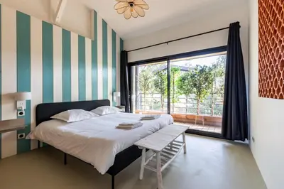 Un ou plusieurs lits dans un hébergement de l'établissement Villa Domus Sciurorum – Pyla-sur-Mer (Domaine Forestier)