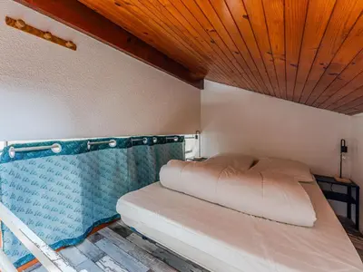 Un ou plusieurs lits dans un hébergement de l'établissement Charmant appartement 4 pers, parking, Wi-Fi, proche océan - FR-1-521-263