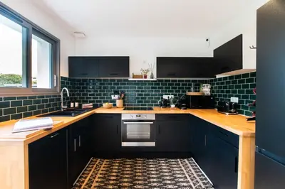 Cuisine ou kitchenette dans l'établissement La La Lande - Hossegor - piscine