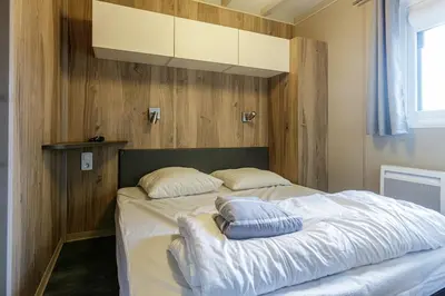 Un ou plusieurs lits dans un hébergement de l'établissement Chalet 809 tout confort en lisière de forêt