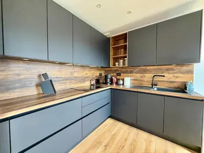 Cuisine ou kitchenette dans l'établissement Charmant duplex parking proche Arcachon