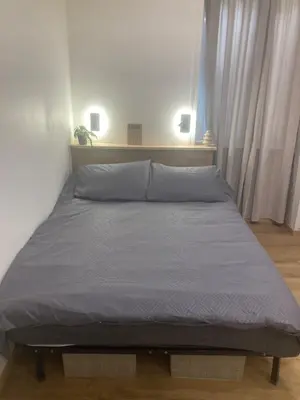 Un ou plusieurs lits dans un hébergement de l'établissement Studio cosy centre-ville