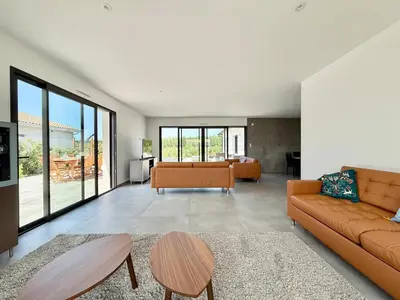 Coin salon dans l'établissement Villa Aurora Piscine 7 personnes