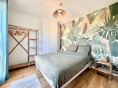 Un ou plusieurs lits dans un hébergement de l'établissement Jolie maison de vacances 8 personnes - Piscine commune à la résidence