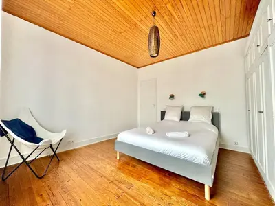 Un ou plusieurs lits dans un hébergement de l'établissement Maison de vacances idéalement située 6pers