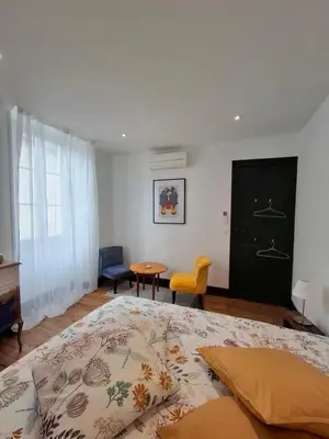 Un ou plusieurs lits dans un hébergement de l'établissement La maison de Lau