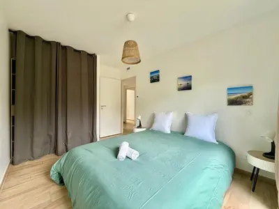 Un ou plusieurs lits dans un hébergement de l'établissement Villa Paloma piscine chauffée 8 pers