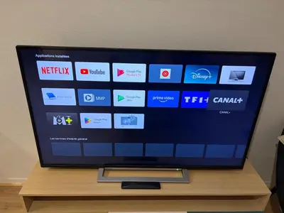 Télévision ou salle de divertissement dans l'établissement T2 Cozy entre plage et lac