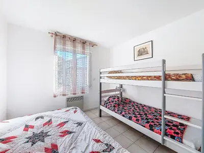 Un ou plusieurs lits dans un hébergement de l'établissement Holiday Home Laplace by Interhome