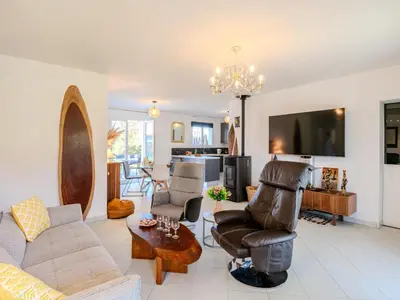 Coin salon dans l'établissement Holiday Home Vaccine-2 by Interhome