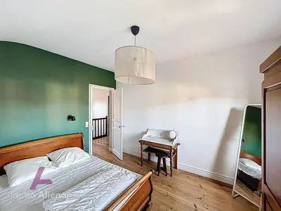Un ou plusieurs lits dans un hébergement de l'établissement Villa spacieuse à Vieux-Boucau, 5 chambres, parking, animaux acceptés - FR-1-857-48