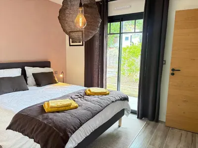 Un ou plusieurs lits dans un hébergement de l'établissement Villa Camille - ARCHIK Plage du Pyla