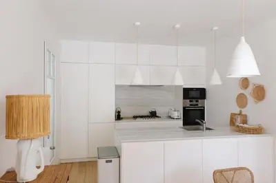 Cuisine ou kitchenette dans l'établissement Villa Les Voiles - ARCHIK Pyla sur Mer - Accès plage