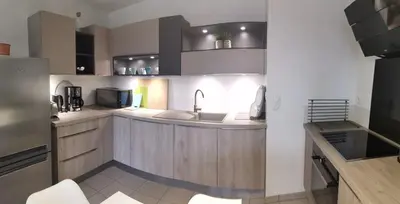 Cuisine ou kitchenette dans l'établissement Spacieux T3 avec terrasse très proche des plages