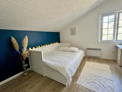 Un ou plusieurs lits dans un hébergement de l'établissement Villa Debussy