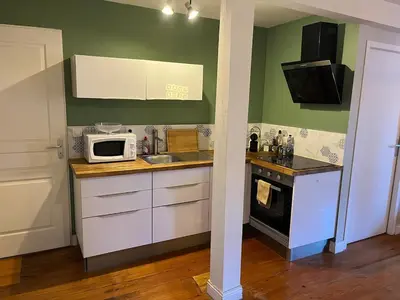 Cuisine ou kitchenette dans l'établissement Le Cocon Authentique