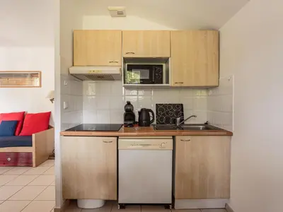 Cuisine ou kitchenette dans l'établissement Allee des Dunes N27 3P6