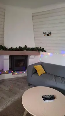 Coin salon dans l'établissement Maison et appartement en rez de chaussée 7 chambres