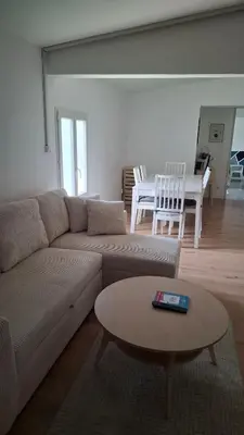 Coin salon dans l'établissement Ateka 2 appartements 4 chambres