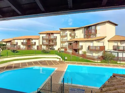 Piscine de l'établissement Appartement 5 pers avec piscine et parking à Vieux-Boucau - FR-1-857-61 ou située à proximité