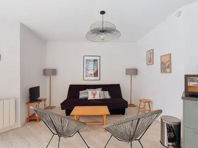 Coin salon dans l'établissement Appartement 5 pers avec piscine et parking à Vieux-Boucau - FR-1-857-61