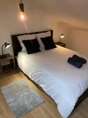 Un ou plusieurs lits dans un hébergement de l'établissement Duplex 4 personnes, Mont-de-Marsan