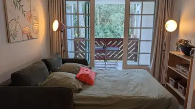 Un ou plusieurs lits dans un hébergement de l'établissement Cosy MO-MAÂ Golf, Océan et Plages