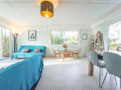 Coin salon dans l'établissement Maison familiale au bord du lac d'Aureilhan pour 10 personnes - FR-1-50-197