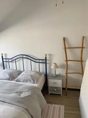 Un ou plusieurs lits dans un hébergement de l'établissement Maison à la campagne avec Piscine et Jacuzzi
