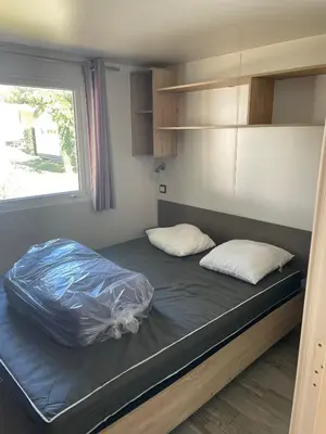 Un ou plusieurs lits dans un hébergement de l'établissement La Plage 4 étoiles à MIMIZAN emplacement E17 3CH 1SDB 6 personnes