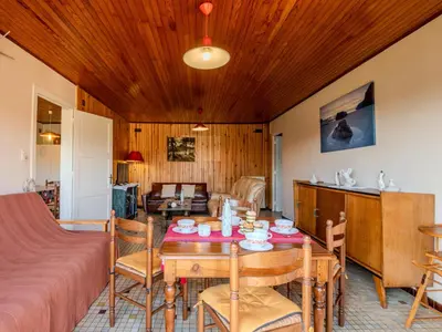Coin salon dans l'établissement Holiday Home Chasseur by Interhome