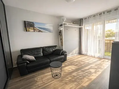 Coin salon dans l'établissement Studio tout confort avec terrasse & parking sécurisé à La Teste-de-Buch - FR-1-474-289